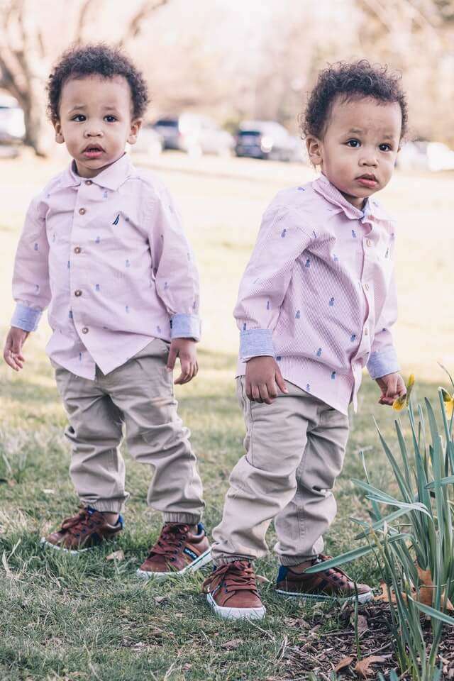 Two kids wearing same clothing and shoes looks like copy paste jobs